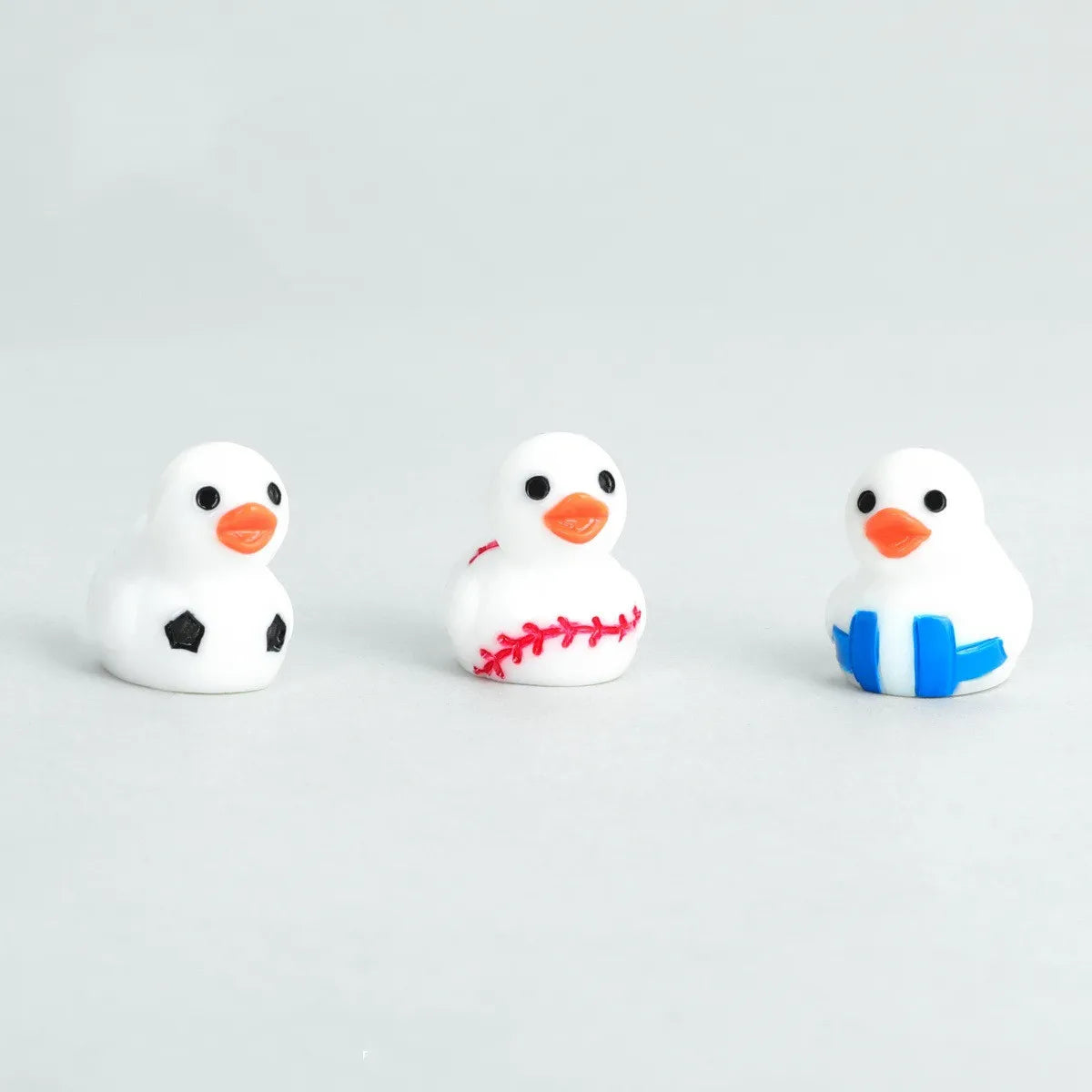 The Ball Duck desk decorative figurines 50/100PCS mini ducks Resin Car decorative DIY Accessories Football Basketball duck